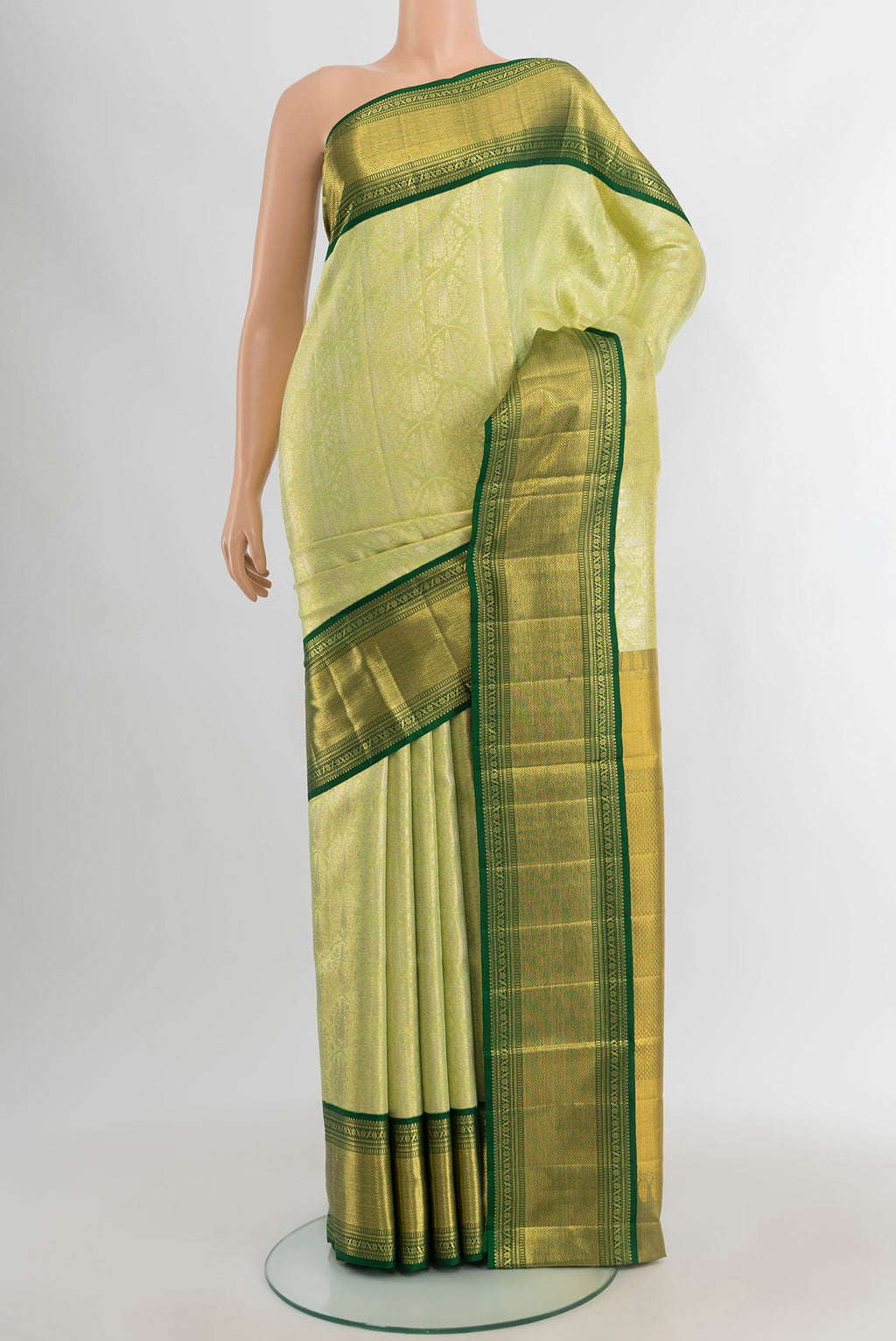 Light Green Kanjivaram Tissue Silk Saree with Zari Brocade on the body and Zari Border.  displayed on a mannequin