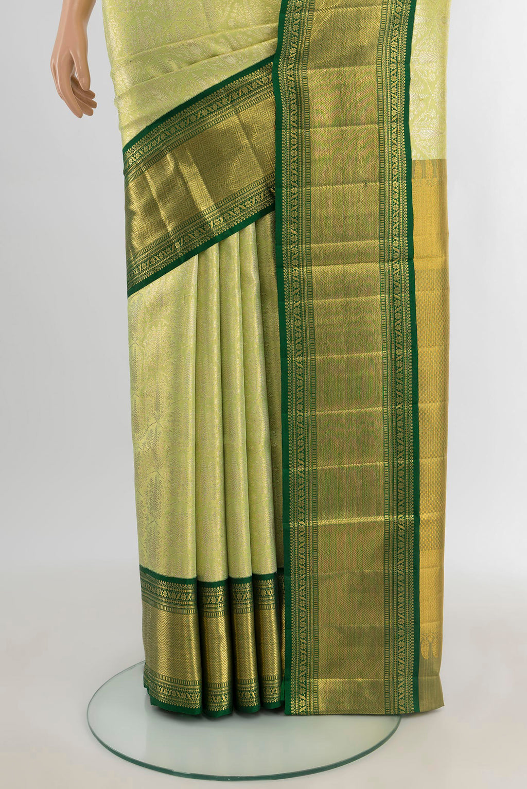 Pleats and pallu of Light Green Kanjivaram Tissue Silk Saree with Zari Brocade on the body and Zari Border. 