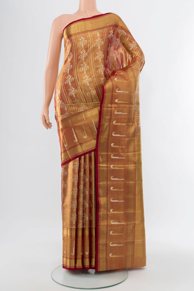 Pure Silk Pure Zari Golden Kanjivaram Saree with Zari Brocade on the body and Silk Border.  displayed on a mannequin