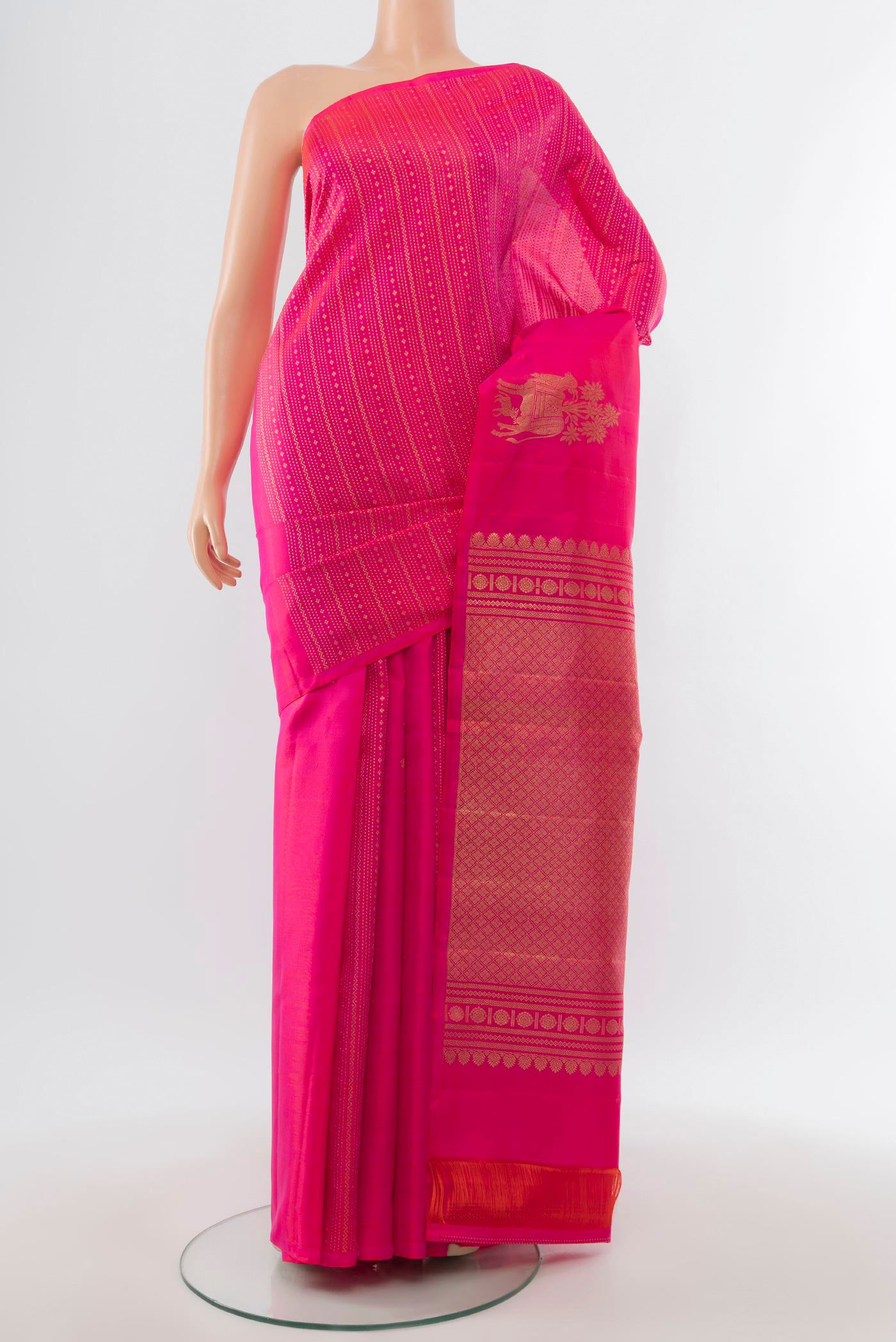 Rani Pink Kanjivaram Silk Saree with Stripes on the body and Without Border.  displayed on a mannequin