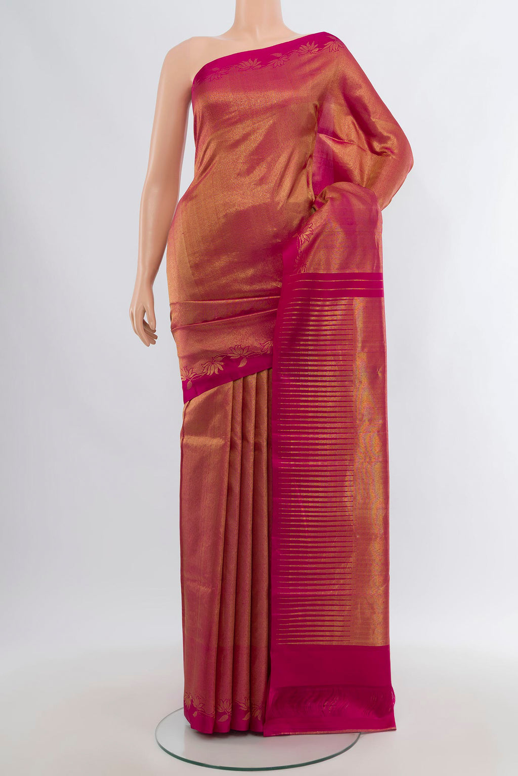 Dark Pink Kanjivaram Silk Saree with Zari Brocade on the body and Temple Border.  displayed on a mannequin