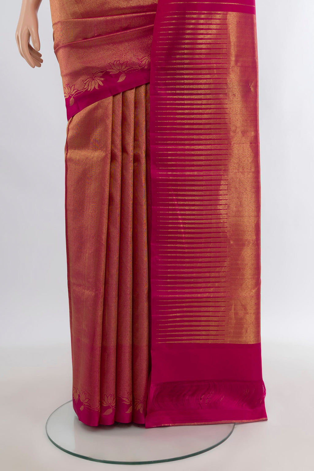 Pleats and pallu of Dark Pink Kanjivaram Silk Saree with Zari Brocade on the body and Temple Border. 