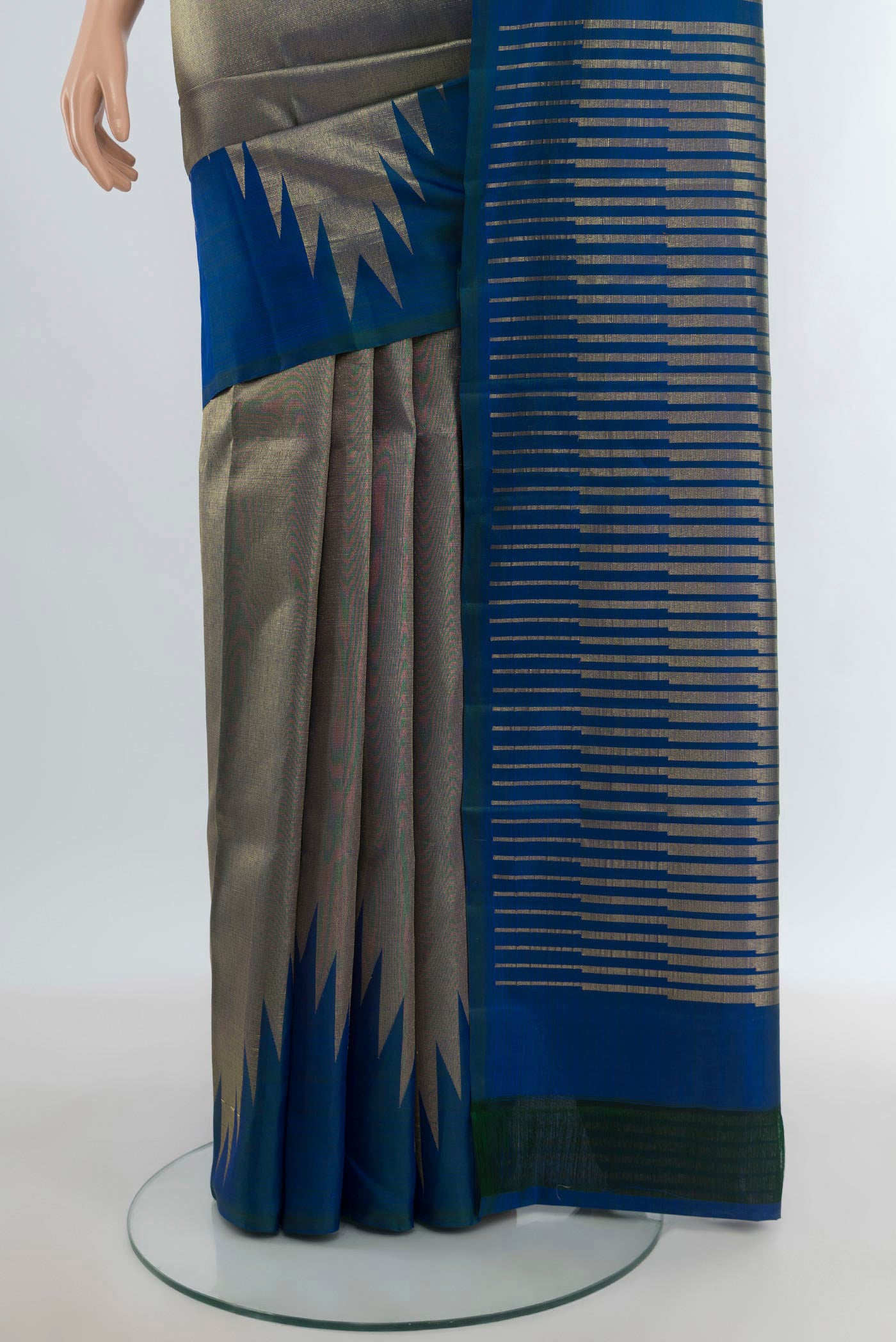 Pleats and pallu of Peacock Blue Kanjivaram Silk Saree with Zari Brocade on the body and Temple Border. 