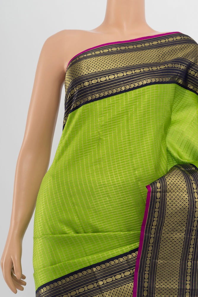 Border image of Light Green Kanchipuram Silk Saree with Zari Butta on the body and Silk Border. 
