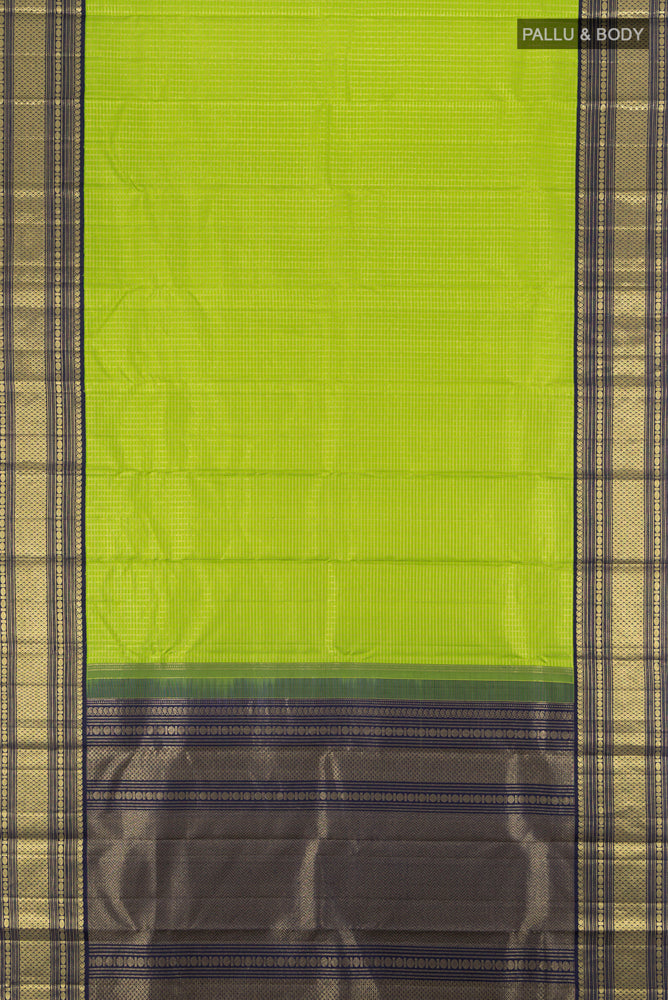 Flat view of Light Green Kanchipuram Silk Saree with Zari Butta on the body and Silk Border. 