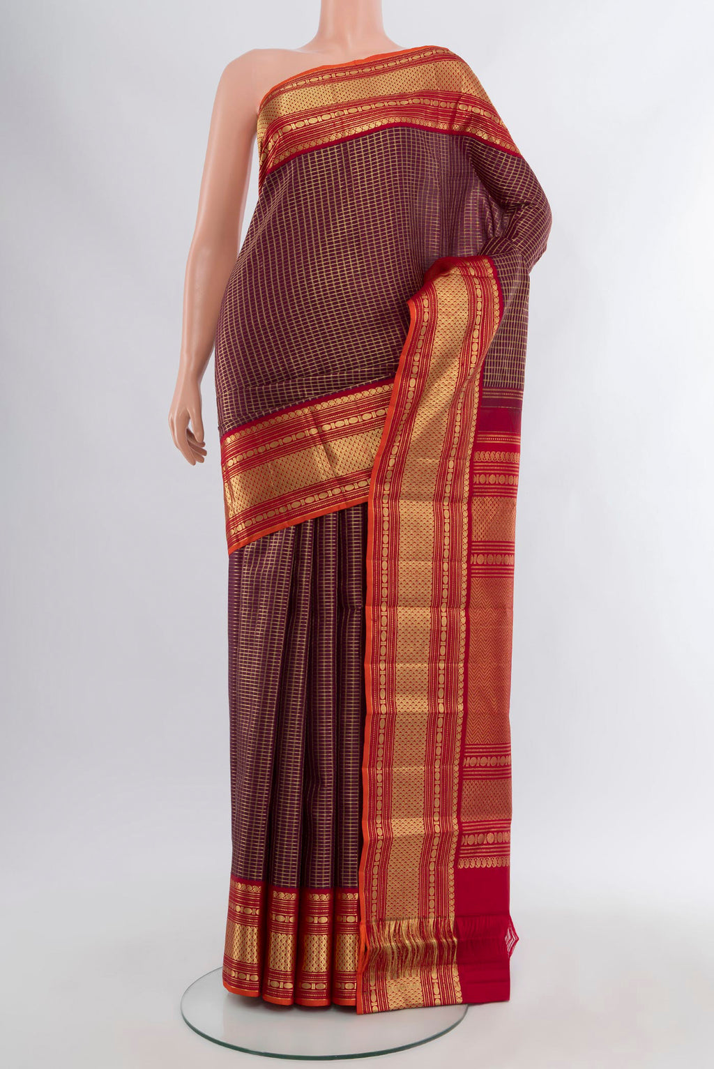 Coffee Brown Kanchipuram Silk Saree with Checked design on the body and Zari Border.  displayed on a mannequin