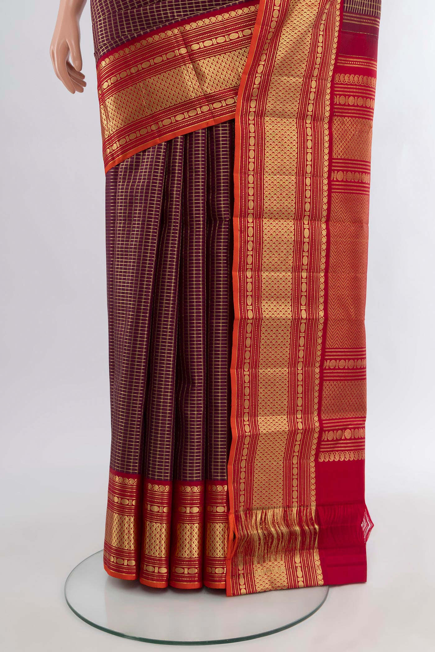Pleats and pallu of Coffee Brown Kanchipuram Silk Saree with Checked design on the body and Zari Border. 
