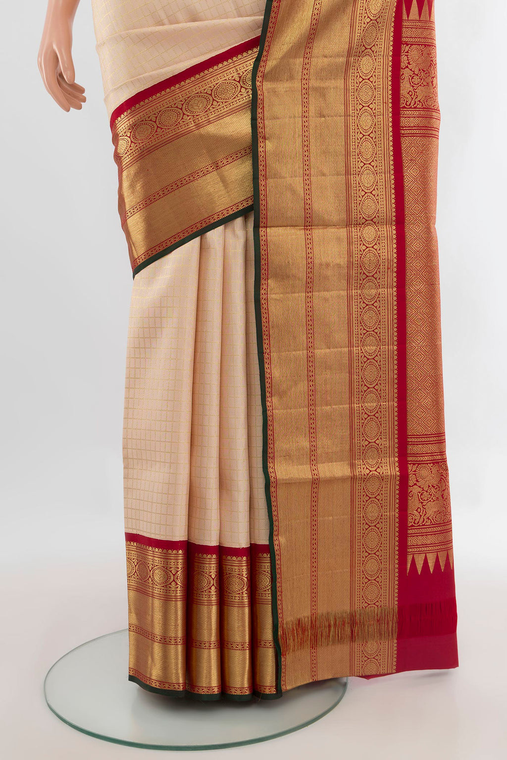 Pleats and pallu of Pure Silk Sandal Kanchipuram Saree with Checked design on the body and Zari Border. 