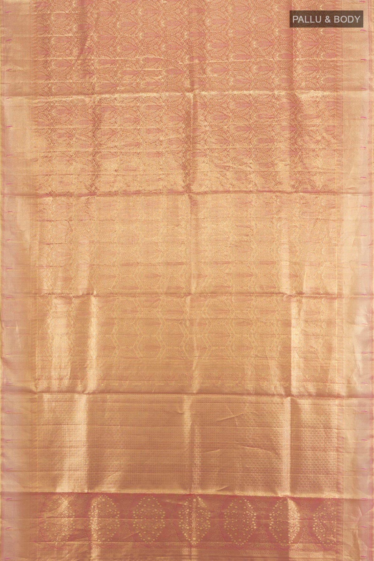 Flat view of Rose Gold Kanjivaram Tissue Silk Saree with Zari Brocade on the body and Zari Border. 