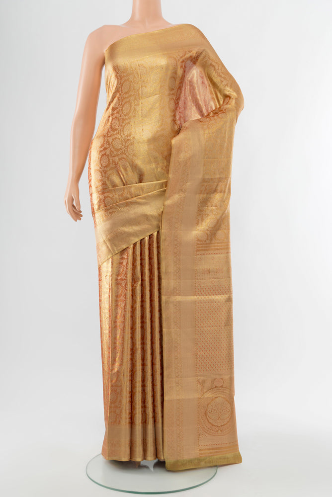 Pure Silk Pure Zari Golden Kanjivaram Saree with Zari Brocade on the body and Silk Border.  displayed on a mannequin