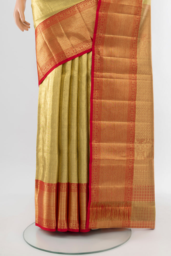 Pleats and pallu of Pure Silk Pure Zari Golden Kanchipuram Saree with Zari Brocade on the body and Silk Border. 