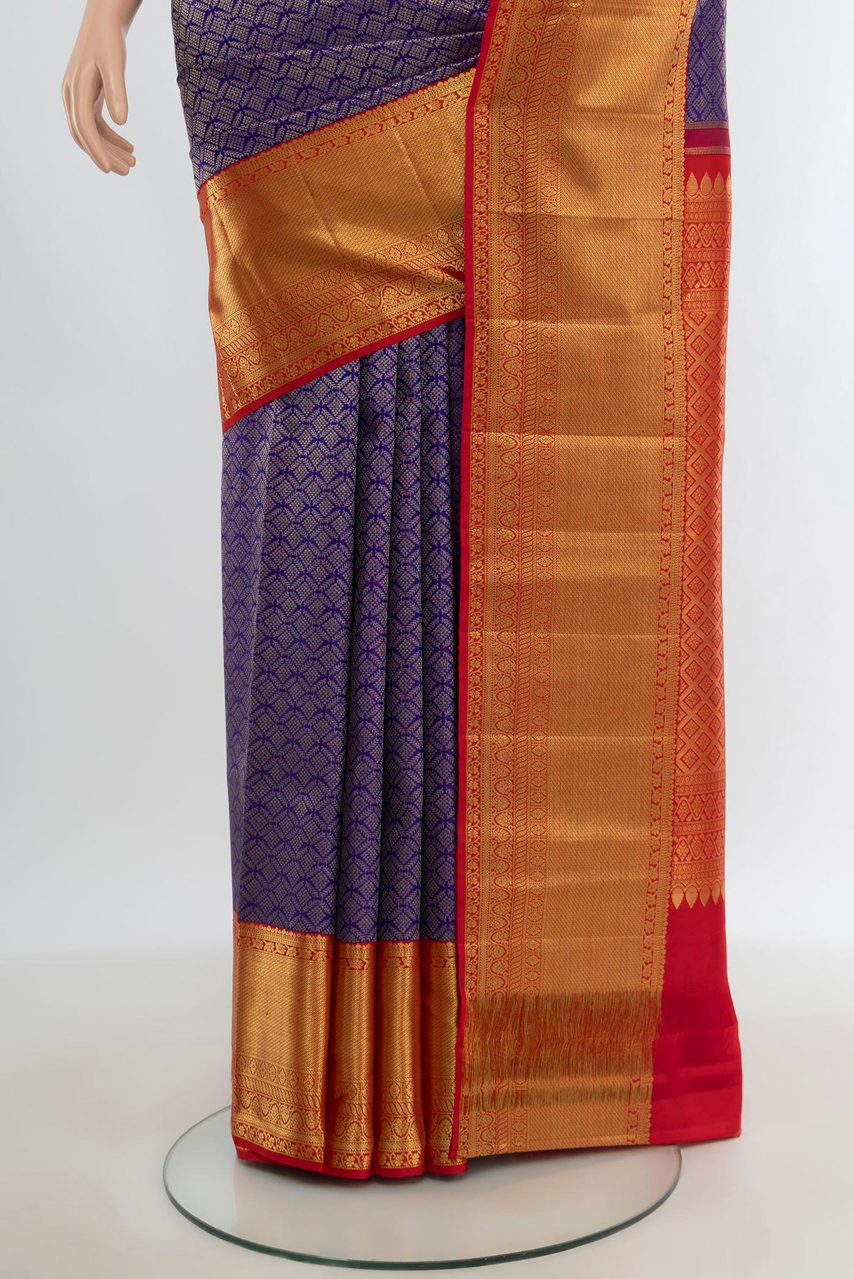 Pleats and pallu of Violet Kanchipuram Silk Saree with Zari Brocade on the body and Zari Border. 