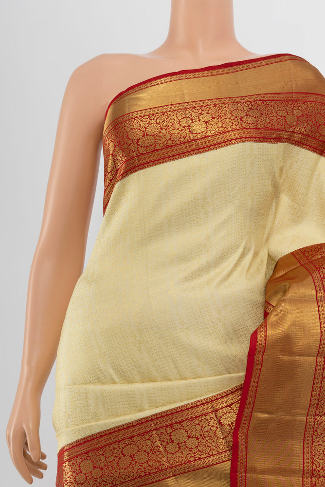 Border image of Golden Kanchipuram Silk Saree with Zari Butta on the body and Silk Border. 