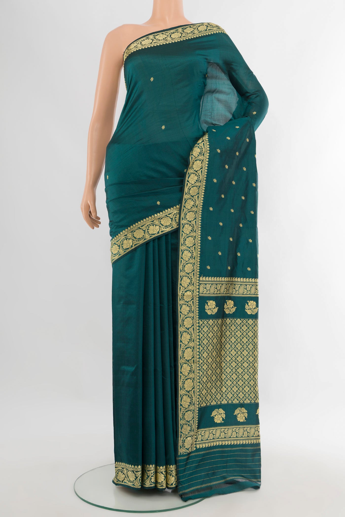 Teal Banarasi Katan Silk Saree with Thread Butta on the body and Thread Border.  displayed on a mannequin