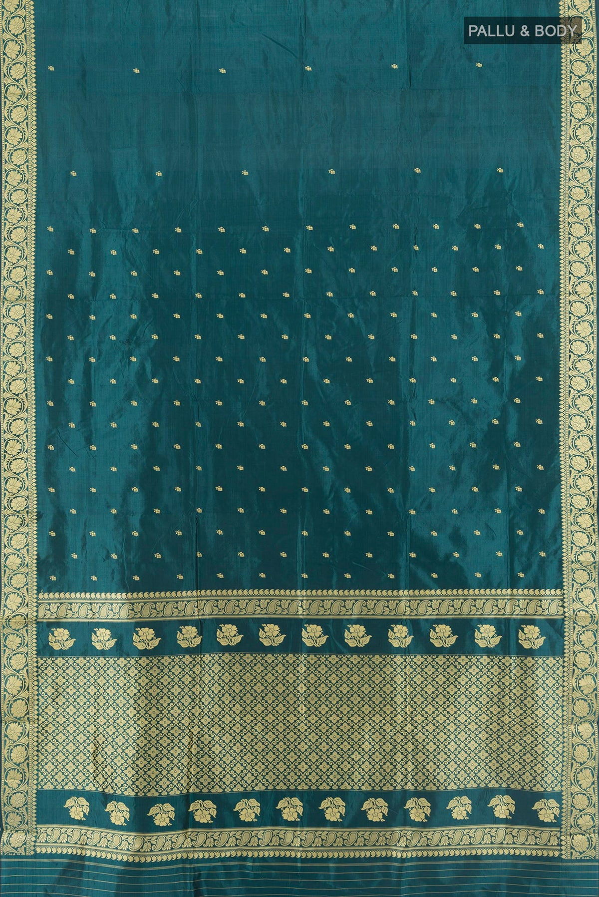 Flat view of Teal Banarasi Katan Silk Saree with Thread Butta on the body and Thread Border. 