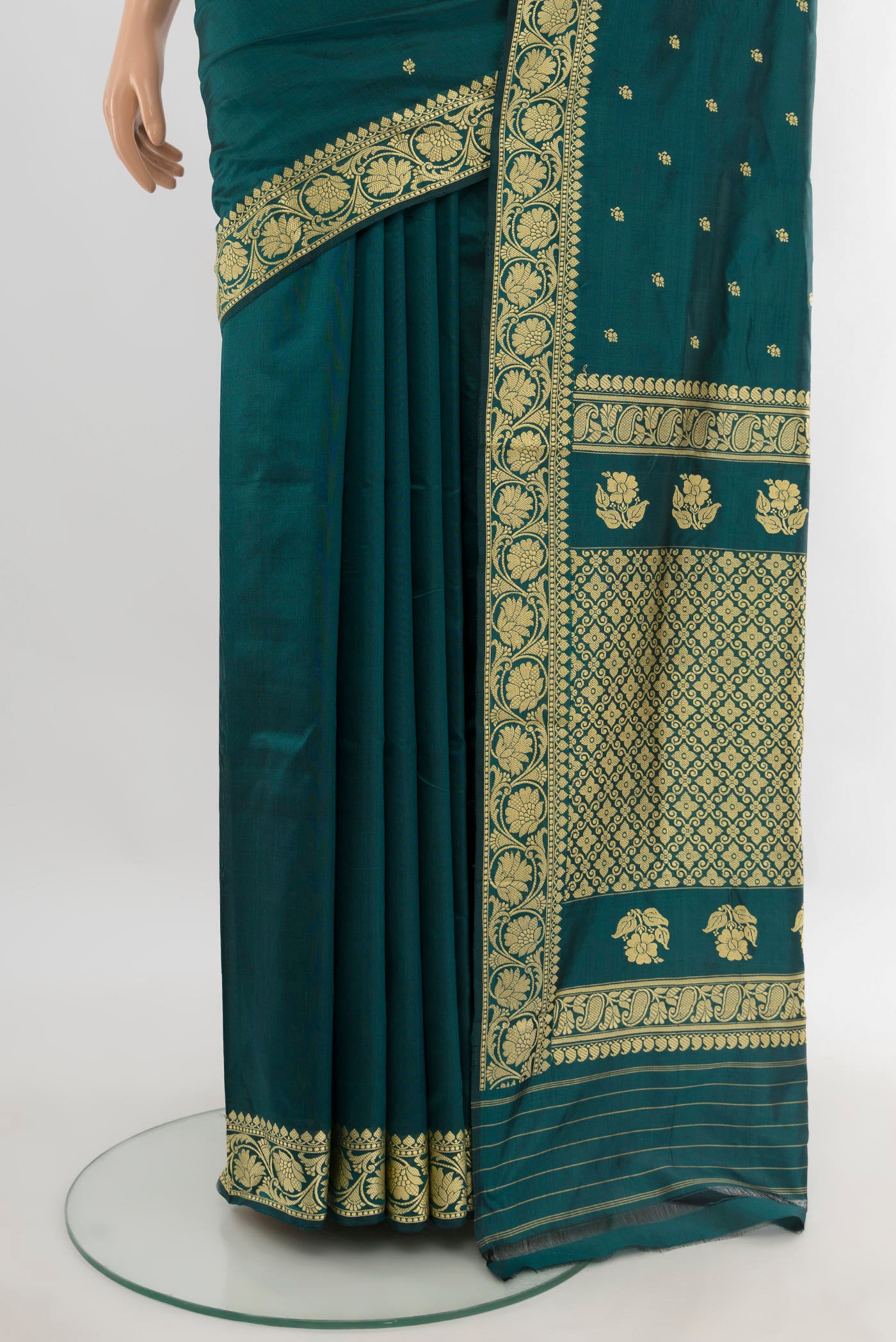 Pleats and pallu of Teal Banarasi Katan Silk Saree with Thread Butta on the body and Thread Border. 