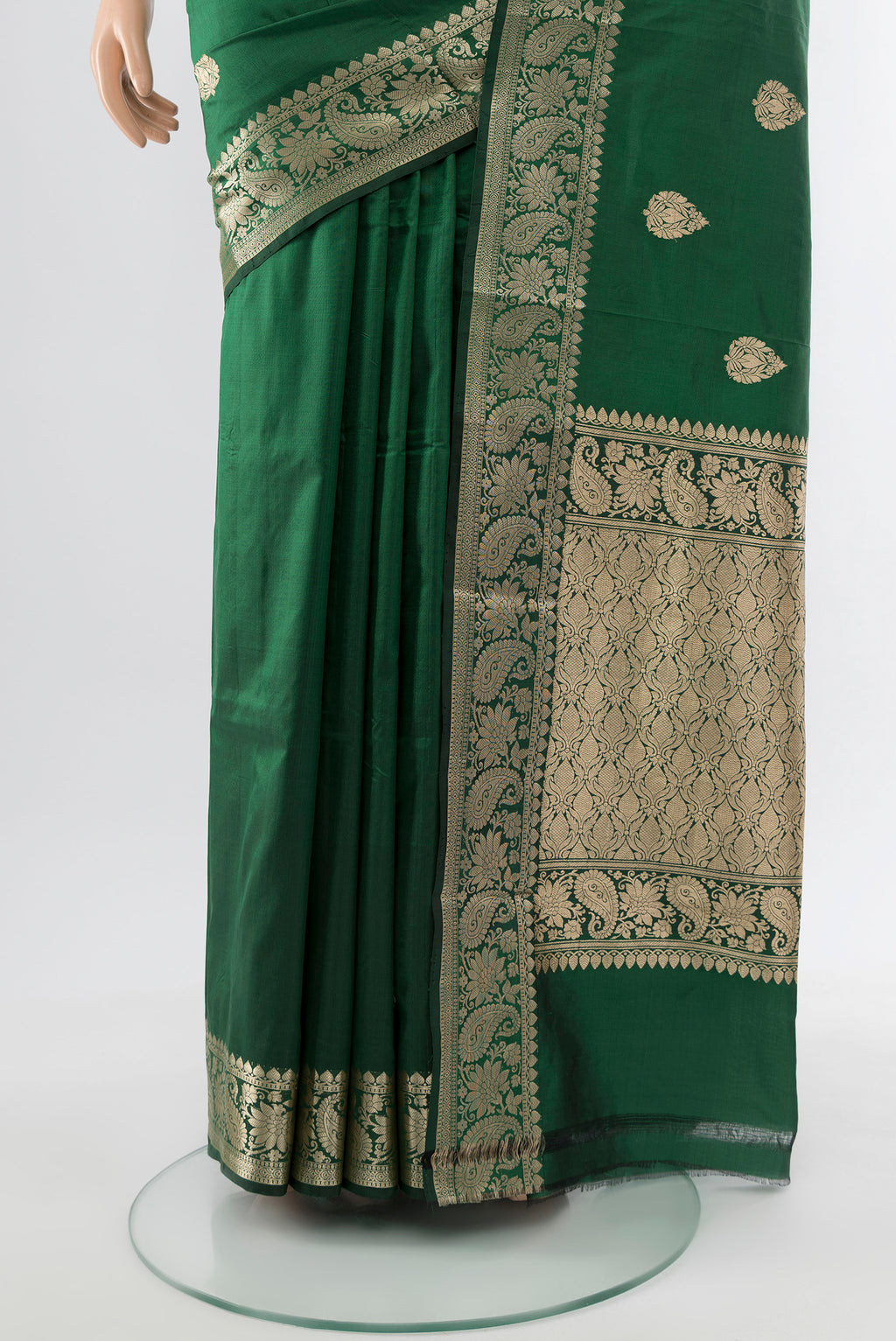 Pleats and pallu of Bottle Green Banarasi Katan Silk Saree with Zari Butta on the body and Silk Border. 