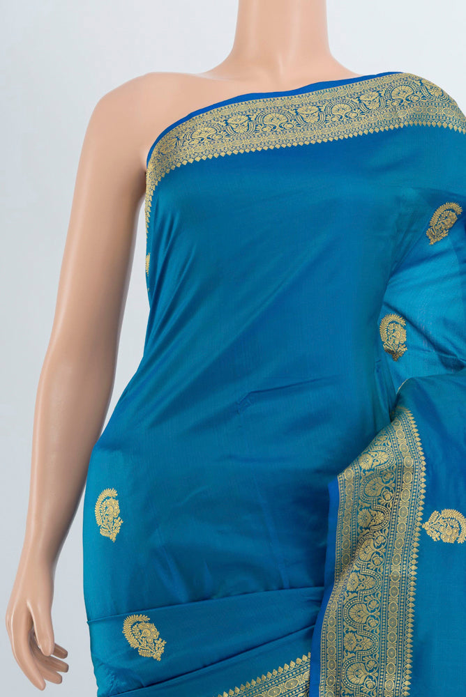 Border image of Peacock Blue Banarasi Katan Silk Saree with Zari Butta on the body and Silk Border. 