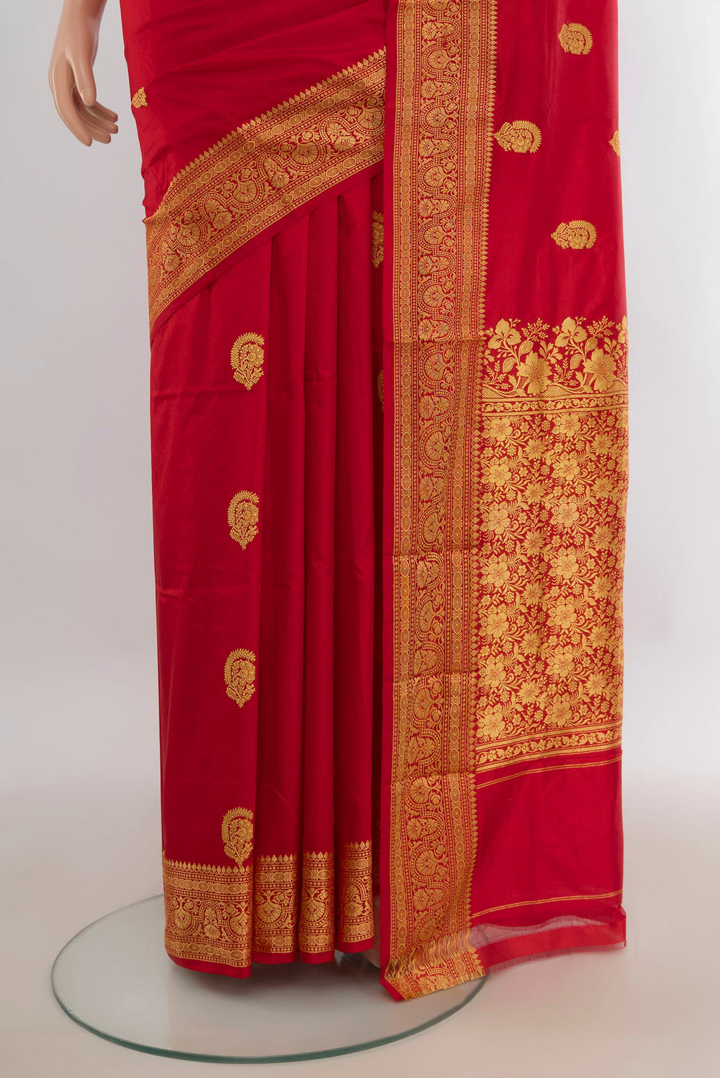 Pleats and pallu of Pure Silk Red Banarasi Katan Saree with Zari Butta on the body and Silk Border. 
