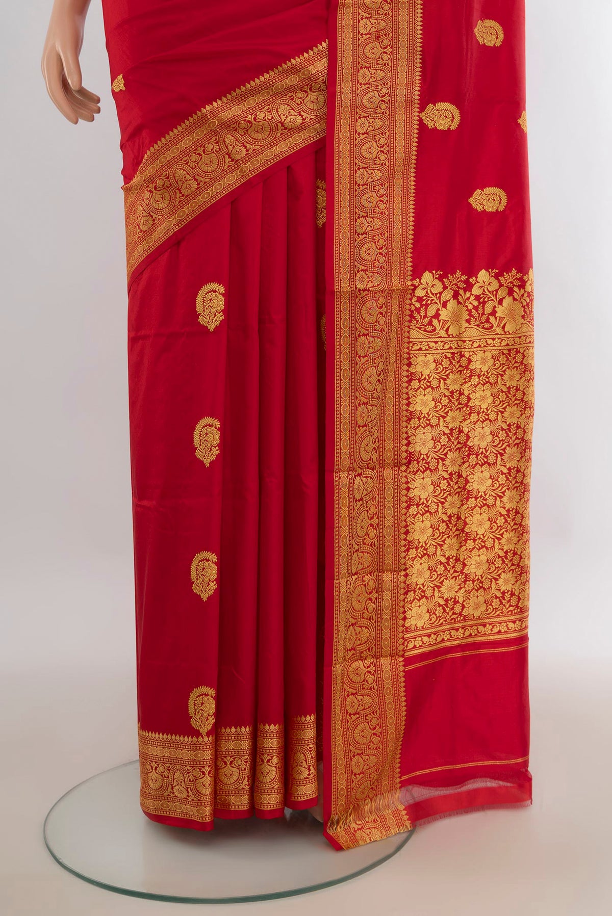 Pleats and pallu of Pure Silk Red Banarasi Katan Saree with Zari Butta on the body and Silk Border. 
