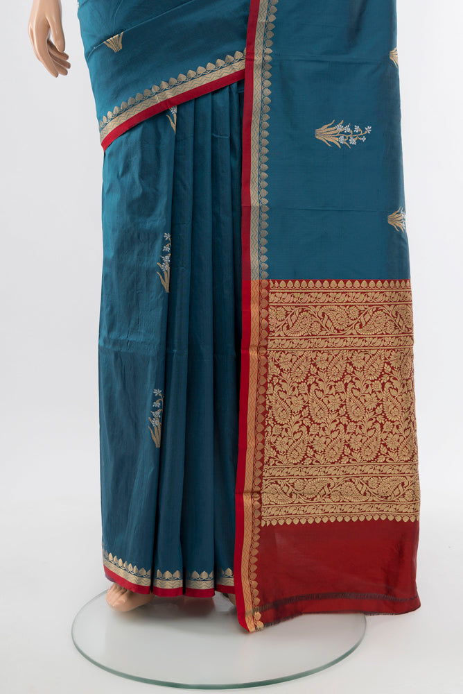 Pleats and pallu of Dark Blue Banarasi Katan Silk Saree with Zari Butta on the body and Silk Border. 