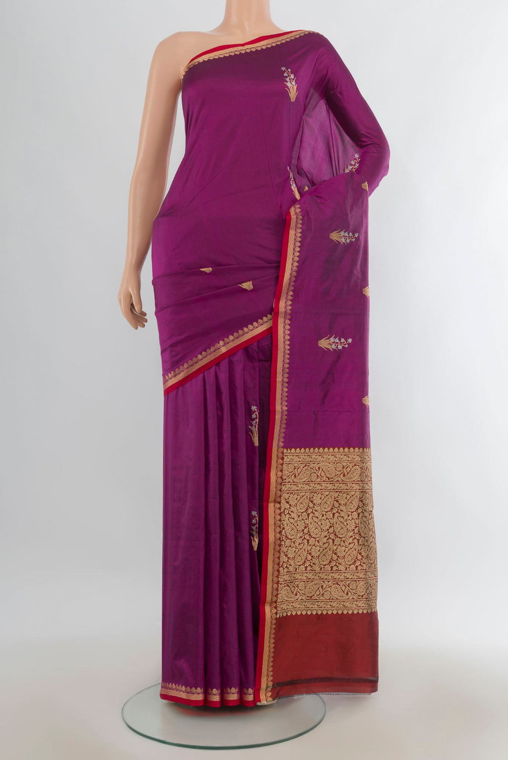 Pure Silk Purple Banarasi Katan Saree with Zari Butta on the body and Zari Border.  displayed on a mannequin