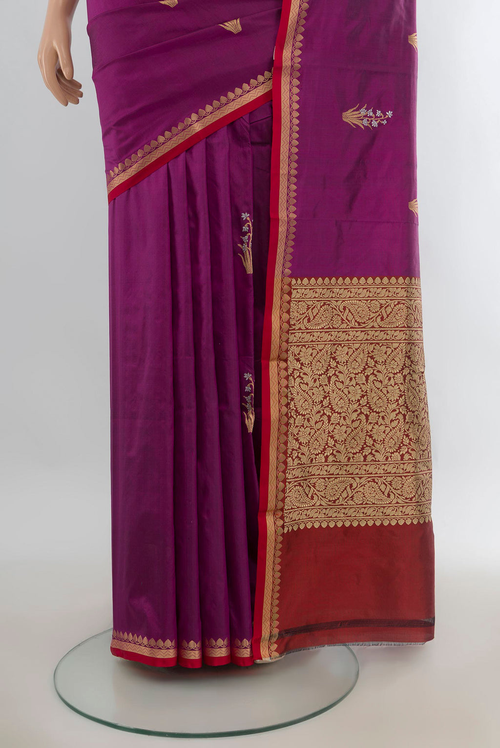 Pleats and pallu of Pure Silk Purple Banarasi Katan Saree with Zari Butta on the body and Zari Border. 