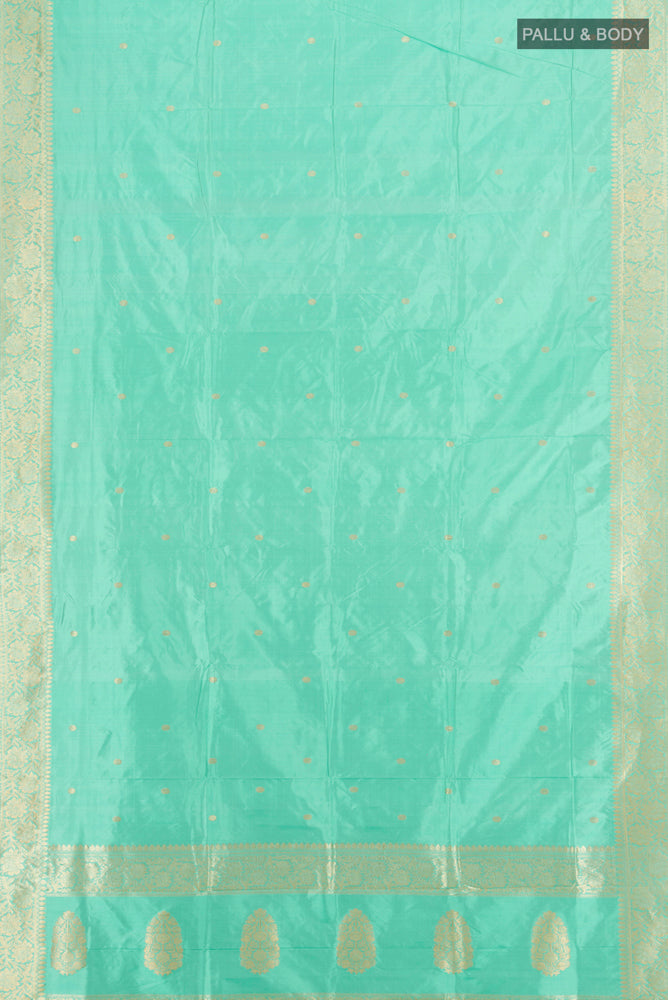 Flat view of Sky Blue Banarasi Katan Silk Saree with Zari Butta on the body and Silk Border. 