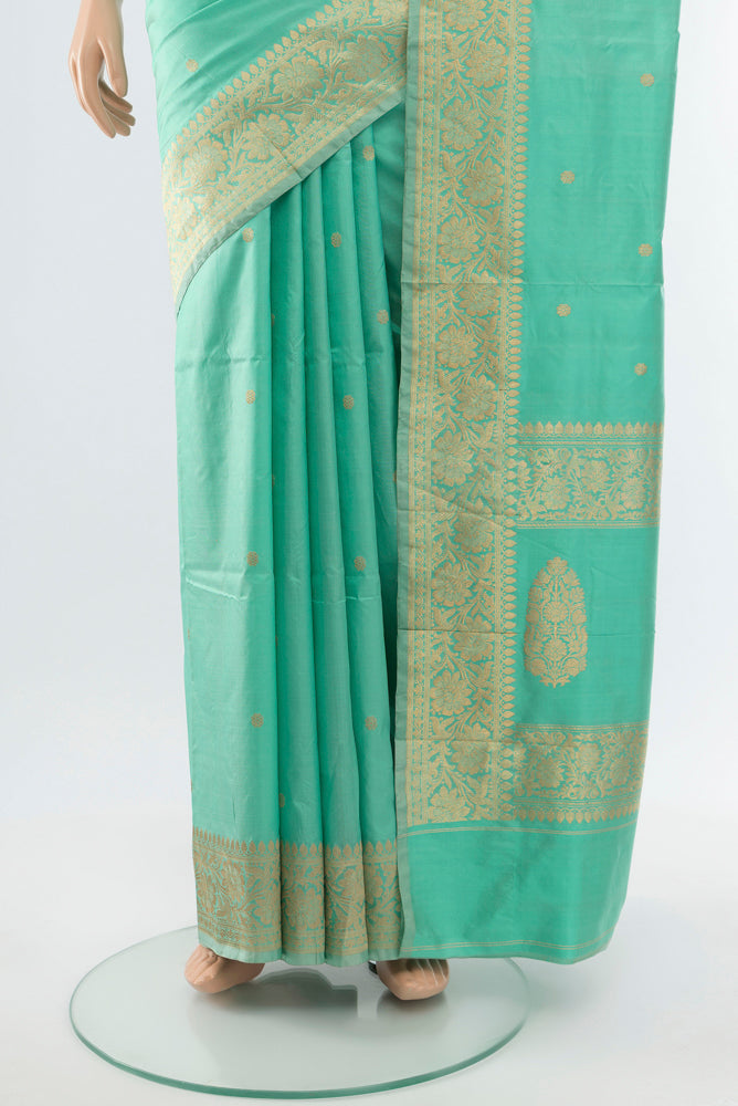 Pleats and pallu of Sky Blue Banarasi Katan Silk Saree with Zari Butta on the body and Silk Border. 