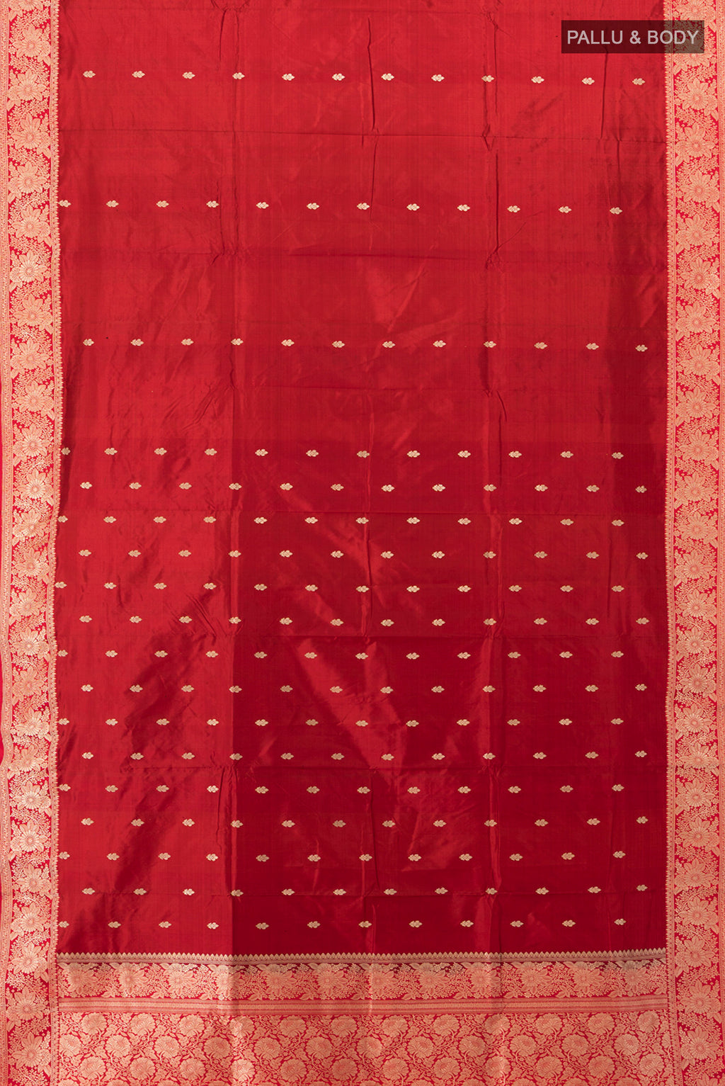 Flat view of Maroon Banarasi Katan Silk Saree with Zari Butta on the body and Silk Border. 
