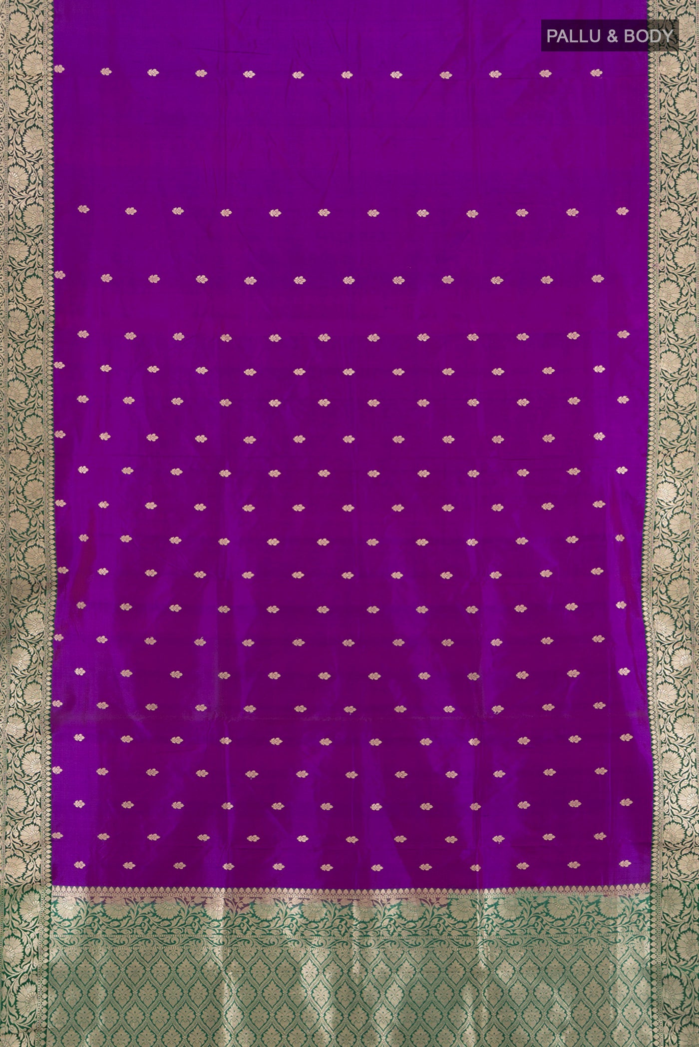 Flat view of Violet Banarasi Katan Silk Saree with Zari Butta on the body and Zari Border. 