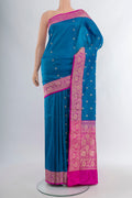 Royal Blue Banarasi Katan Silk Saree with Zari Butta on the body and Zari Border.  displayed on a mannequin