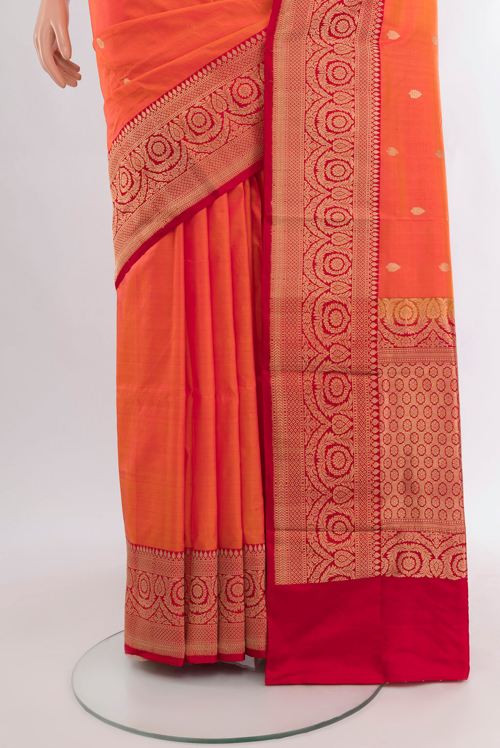 Pleats and pallu of Peach Banarasi Katan Silk Saree with Zari Butta on the body and Zari Border. 