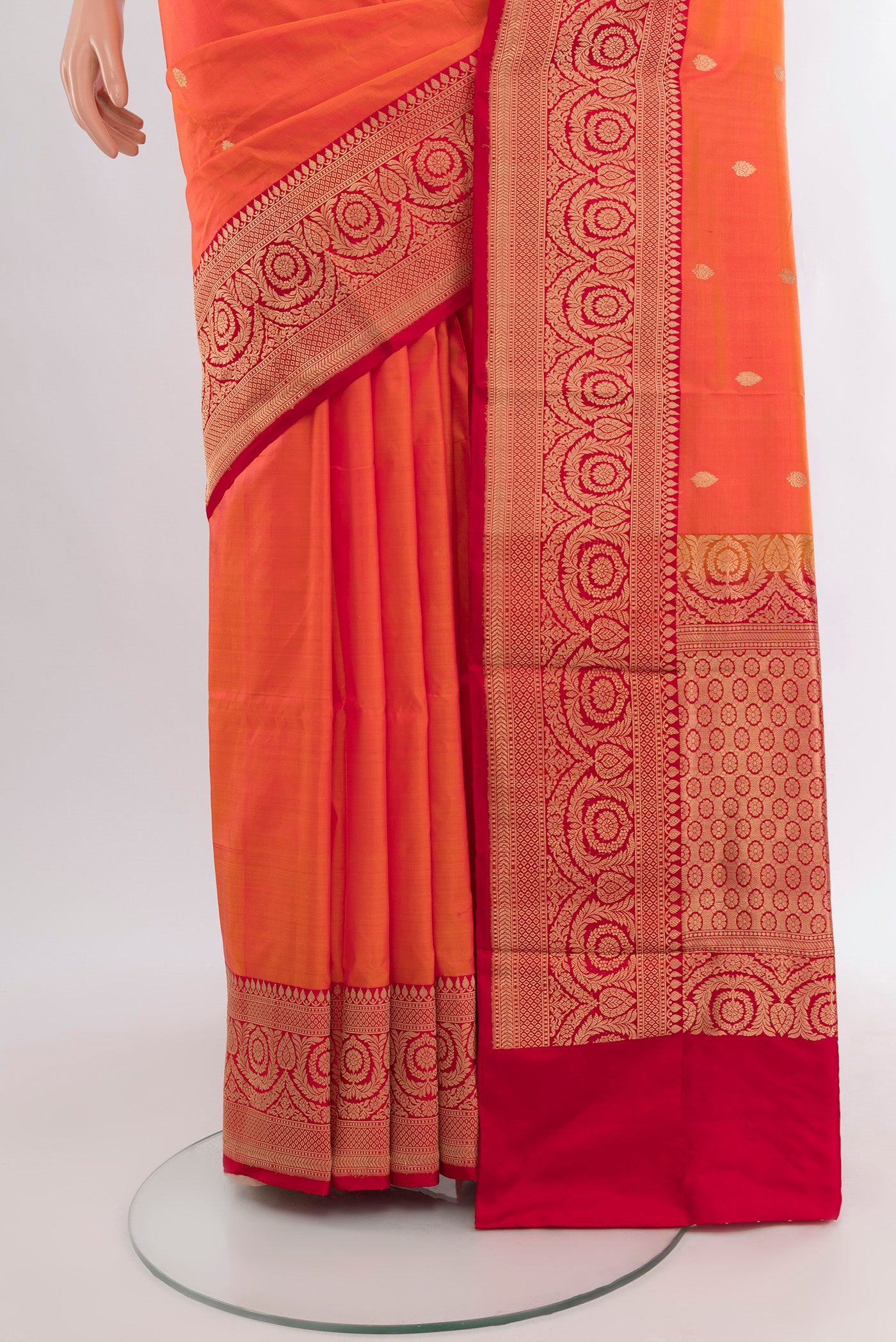 Pleats and pallu of Peach Banarasi Katan Silk Saree with Zari Butta on the body and Zari Border. 