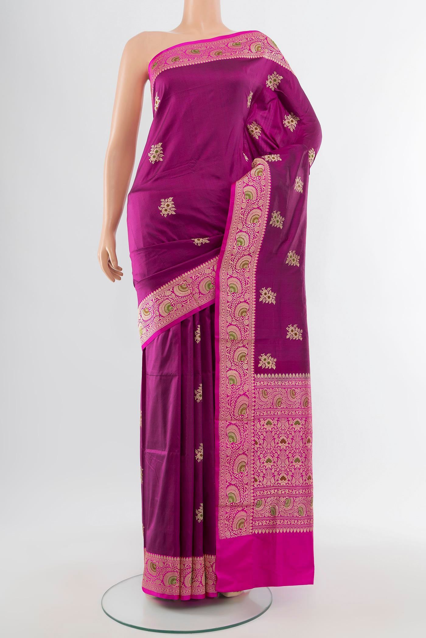 Purple Banarasi Katan Silk Saree with Zari Butta on the body and Silk Border.  displayed on a mannequin