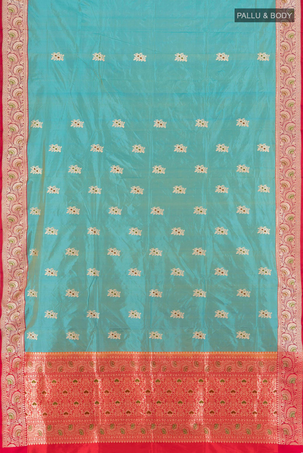 Flat view of Light Blue Banarasi Katan Silk Saree with Zari Butta on the body and Zari Border. 