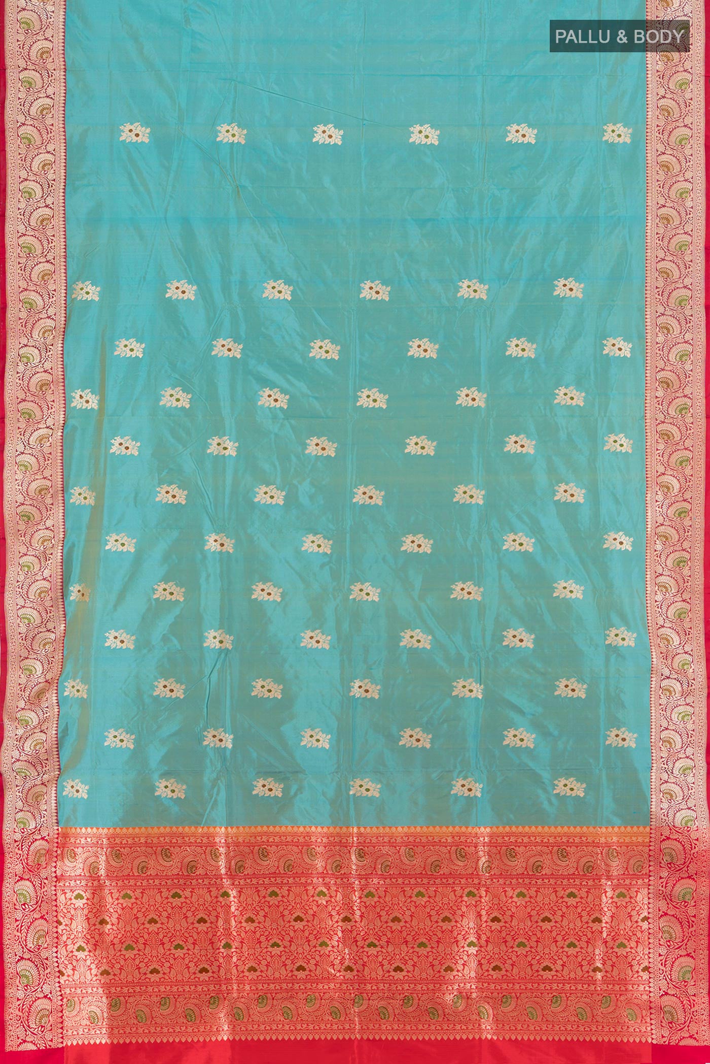Flat view of Light Blue Banarasi Katan Silk Saree with Zari Butta on the body and Zari Border. 