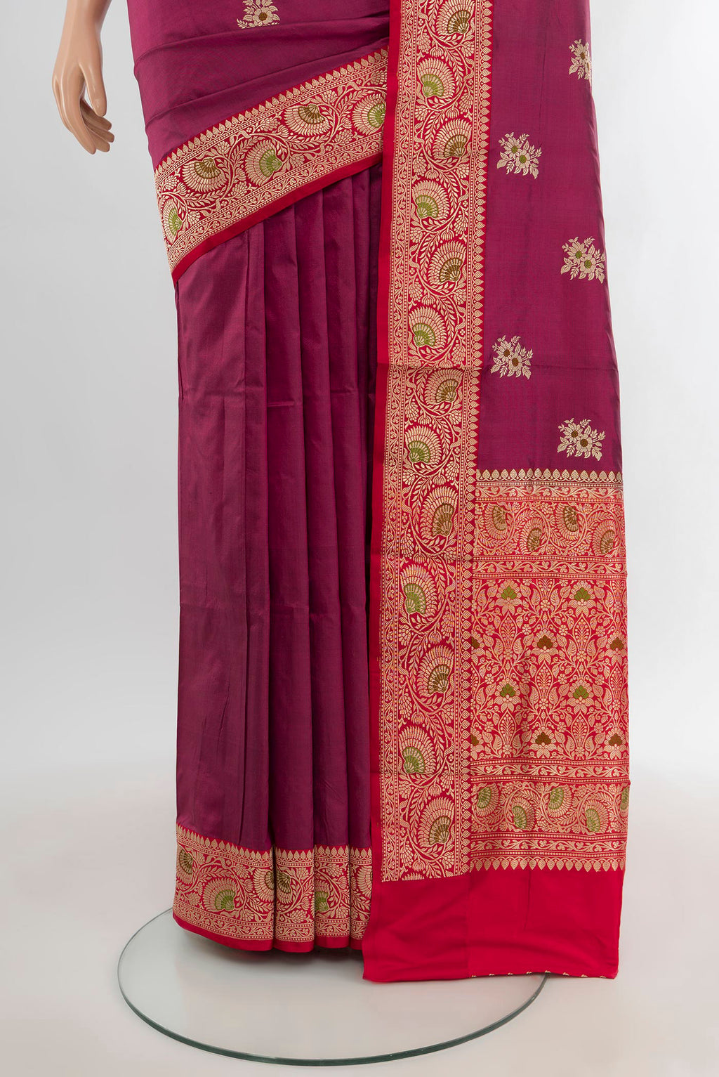 Pleats and pallu of Magenta Banarasi Katan Silk Saree with Zari Butta on the body and Zari Border. 