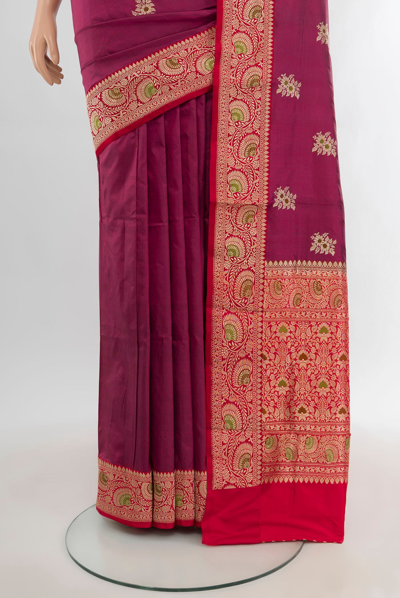 Pleats and pallu of Magenta Banarasi Katan Silk Saree with Zari Butta on the body and Zari Border. 