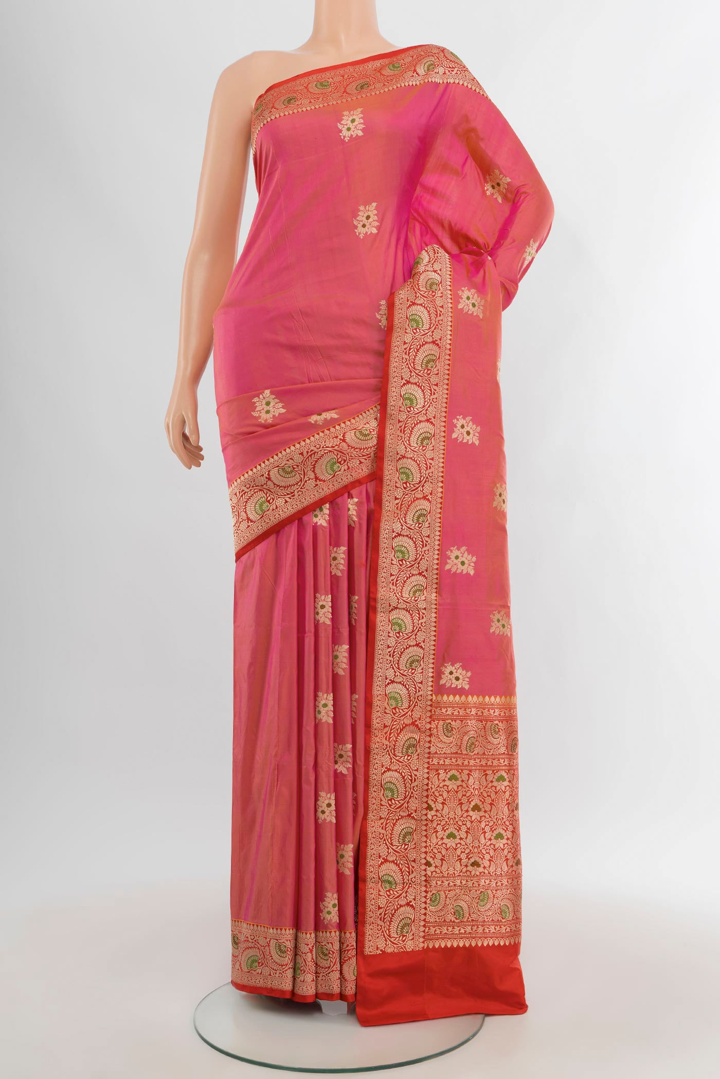 Pink Banarasi Katan Silk Saree with Zari Butta on the body and Zari Border.  displayed on a mannequin