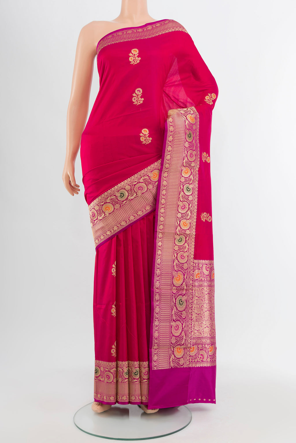 Dark Pink Baluchari Silk Saree with Zari Butta on the body and Silk Border.  displayed on a mannequin