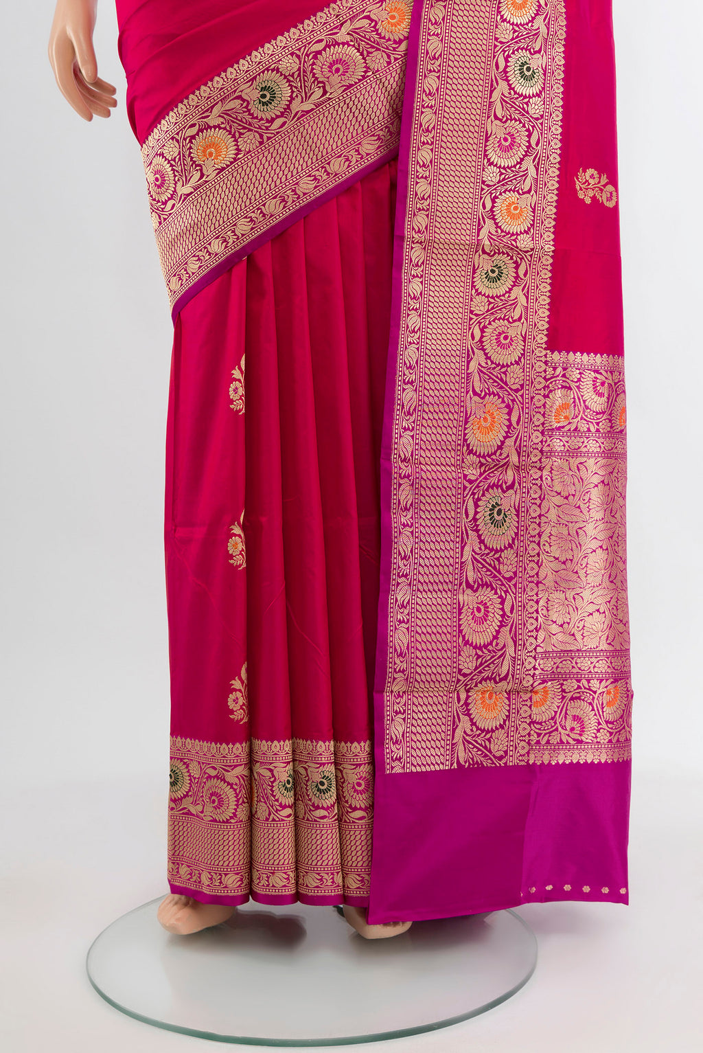 Pleats and pallu of Dark Pink Baluchari Silk Saree with Zari Butta on the body and Silk Border. 