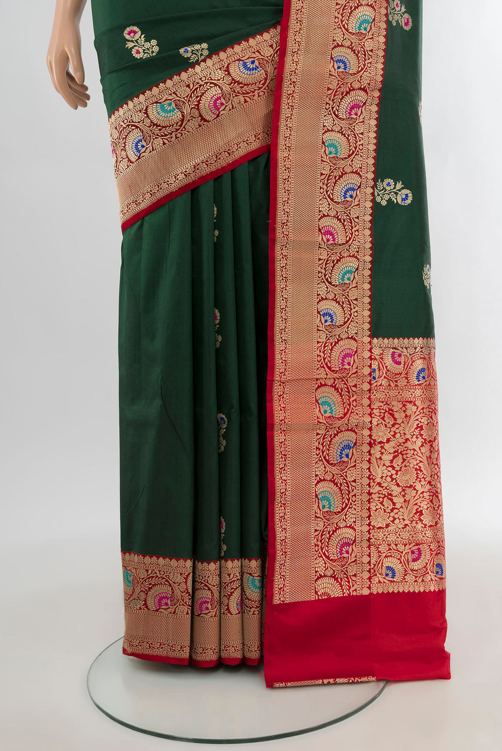 Pleats and pallu of Bottle Green Banarasi Katan Silk Saree with Zari Butta on the body and Zari Border. 