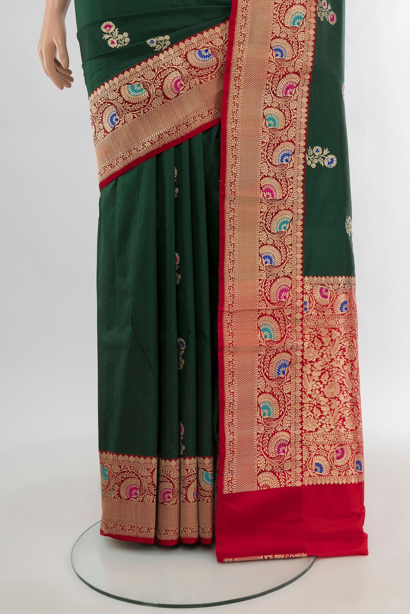 Pleats and pallu of Bottle Green Banarasi Katan Silk Saree with Zari Butta on the body and Zari Border. 