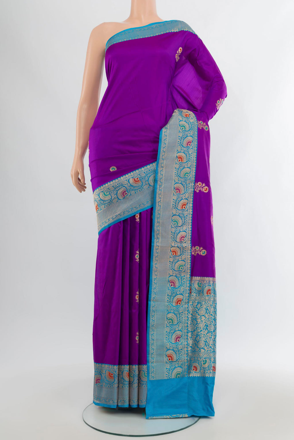 Purple Banarasi Katan Silk Saree with Zari Butta on the body and Zari Border.  displayed on a mannequin
