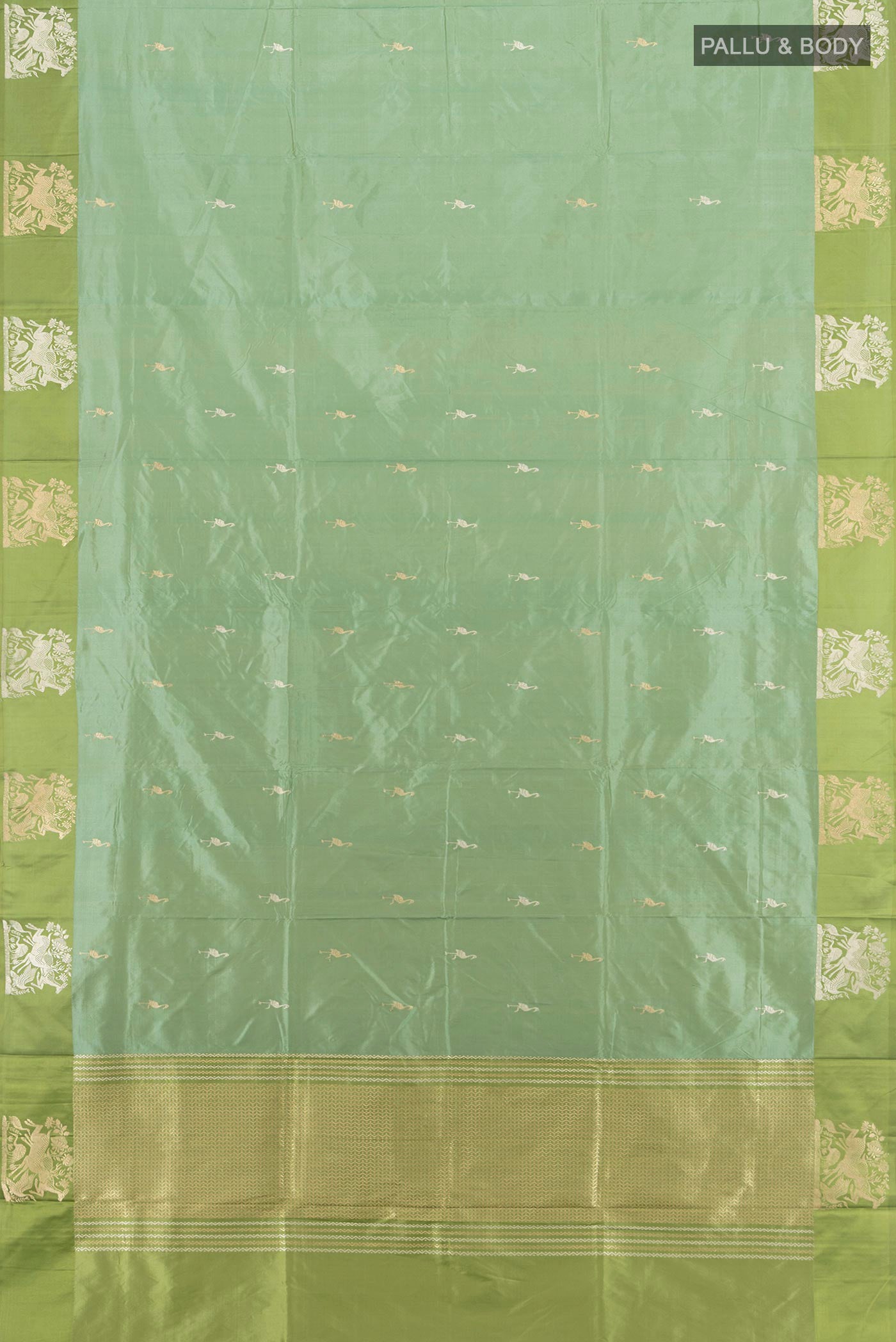 Flat view of Sage Green Banarasi Katan Silk Saree with Zari Butta on the body and Temple Thread Border. 