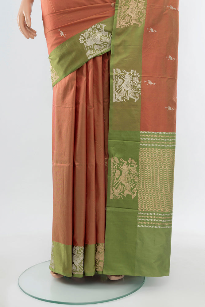 Pleats and pallu of Peach Banarasi Katan Silk Saree with Zari Butta on the body and Silk Border. 