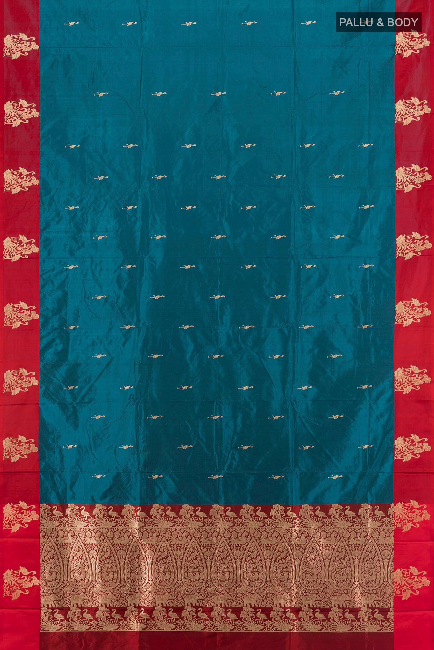 Flat view of Dark Blue Banarasi Katan Silk Saree with Zari Butta on the body and Silk Border. 