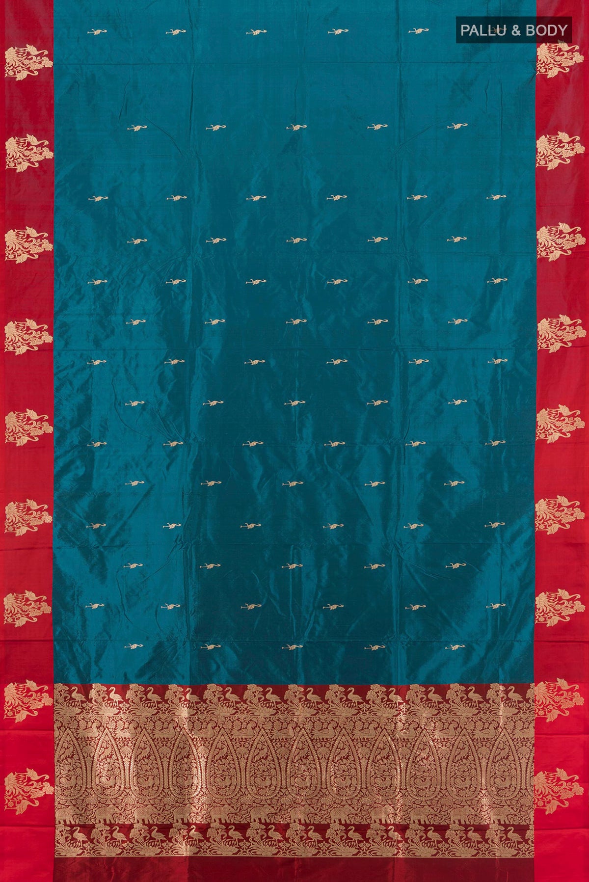 Flat view of Dark Blue Banarasi Katan Silk Saree with Zari Butta on the body and Silk Border. 