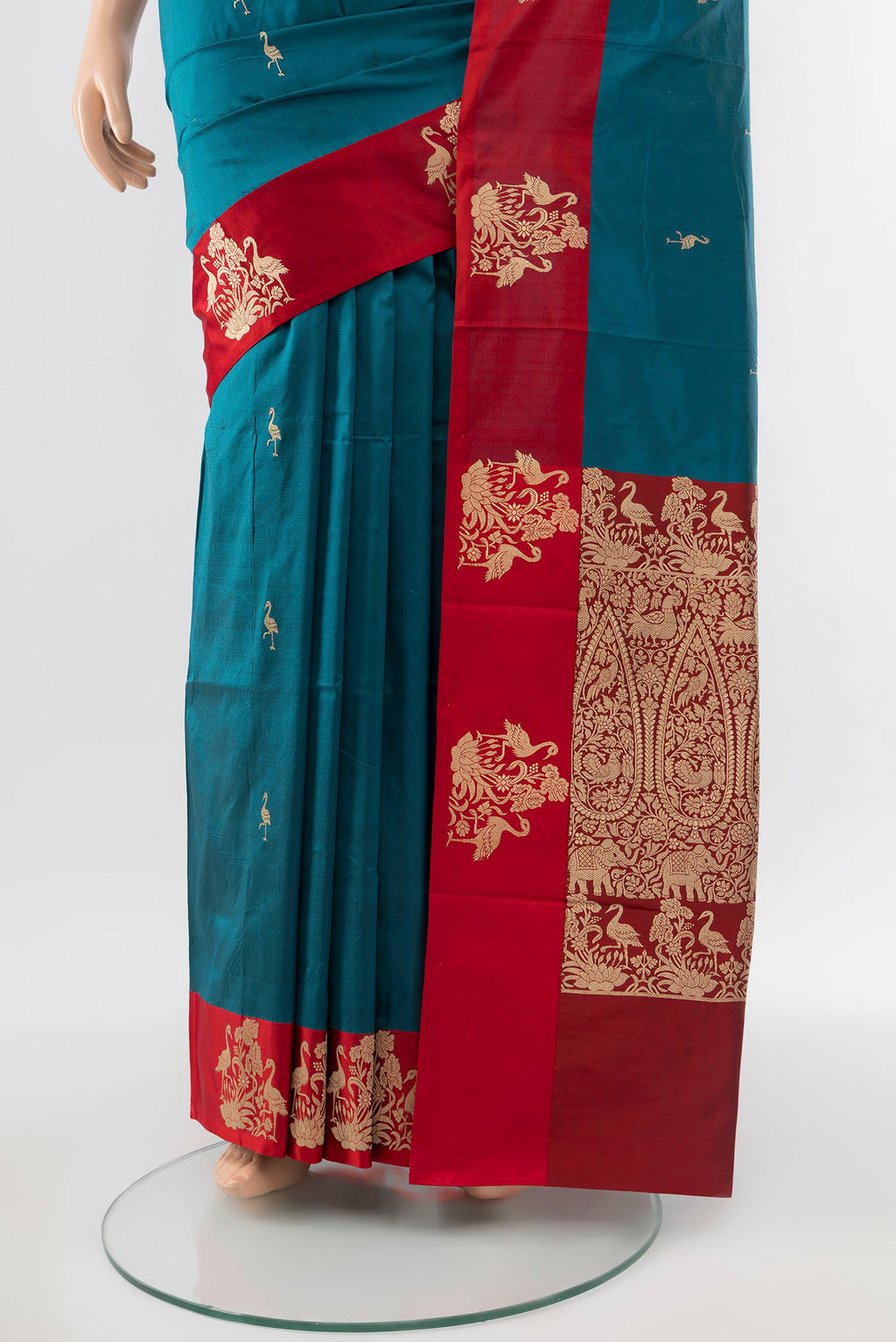 Pleats and pallu of Dark Blue Banarasi Katan Silk Saree with Zari Butta on the body and Silk Border. 